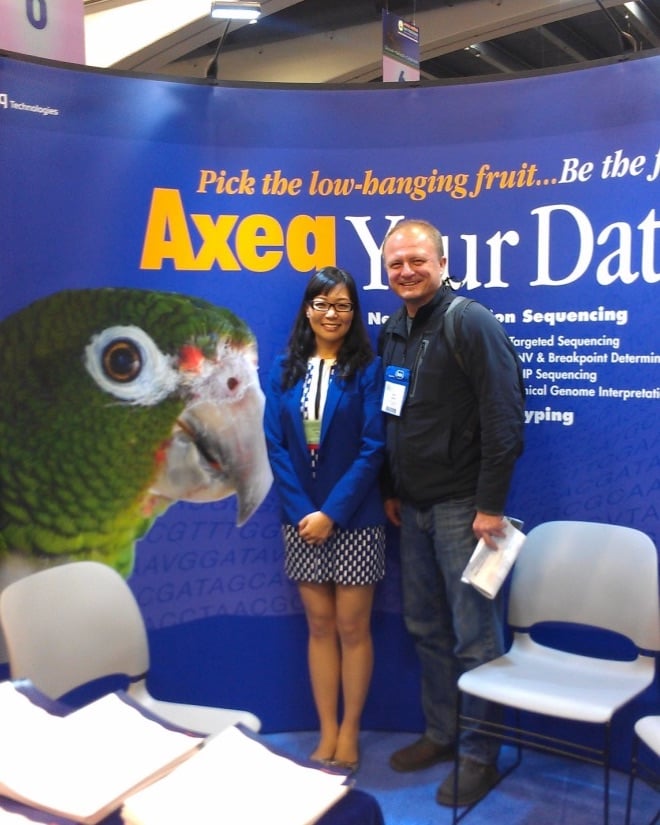 Dr Oleksyk and a graduate student at the Axeq booth at ASHG 2012.