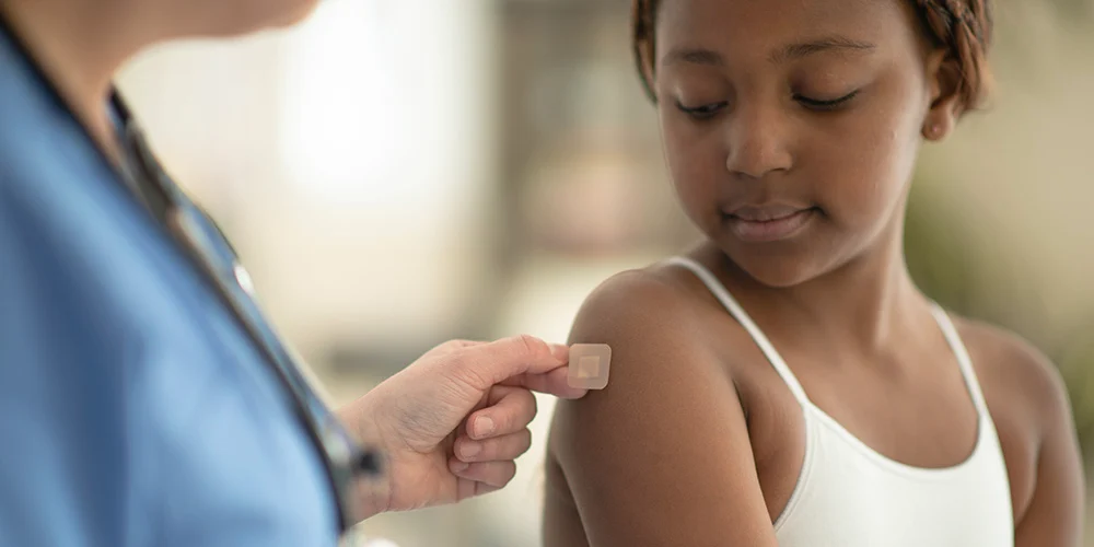 Child receiving vaccine