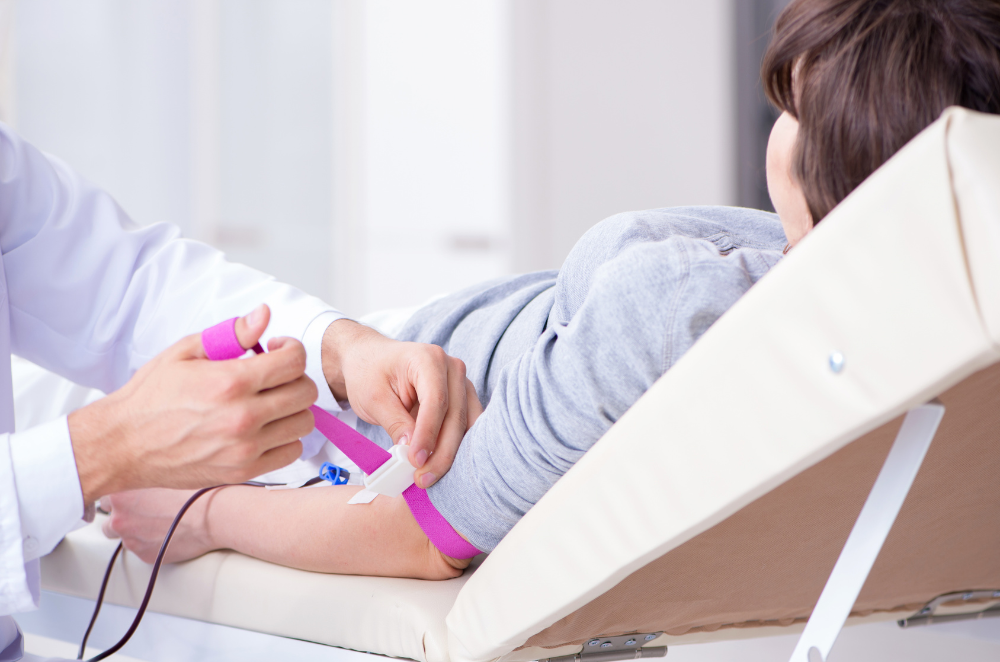 person receiving a blood transfusion